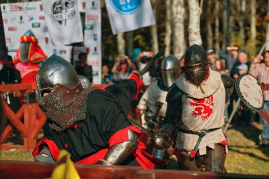 Dive into an exhilarating medieval battle featuring armored knights at an extraordinary, historic tournament event