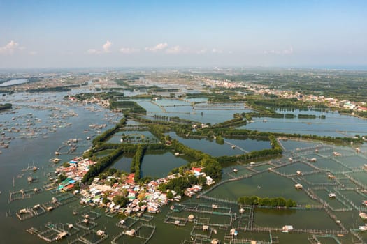 Aerial view of Fish pond farm in the countryside of the Philippines.