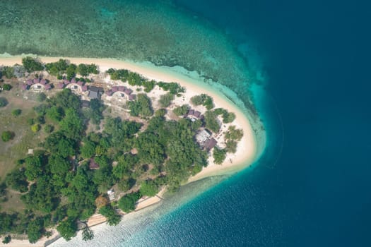 Aerial drone of sandy beach on a tropical island. Putipot island, Philippines.