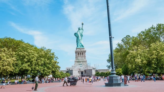 The Statue of Liberty, New York City on sunny blue sky. American symbol. Memorial day, Patriot Day. Space for text. New York NY USA 2023-07-30.