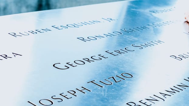 Memorial at Ground Zero Manhattan for September 11 Terrorist Attack with Engraved Names of Victims. Patriot Day - New York NY USA 2023-07-30.