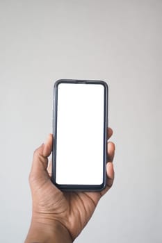 pov shot of f young man hand using smart phone with empty screen ,