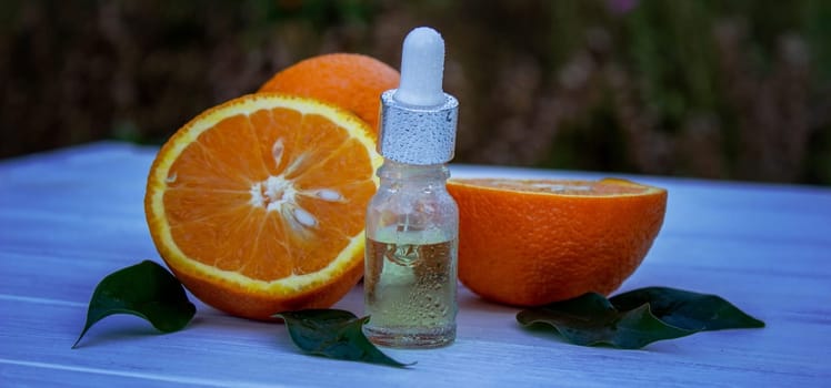 orange essential oil. selective focus
