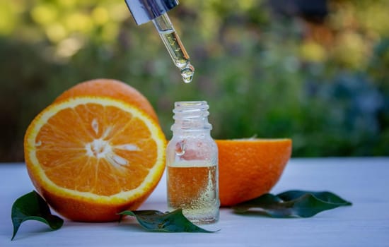 orange essential oil. selective focus