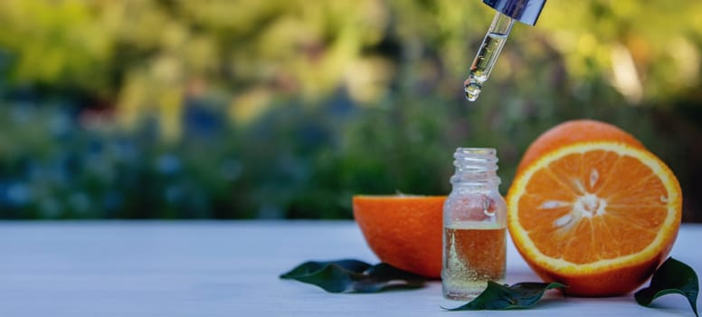 orange essential oil. selective focus
