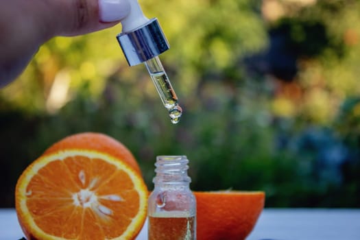 orange essential oil. selective focus