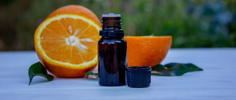 orange essential oil. selective focus
