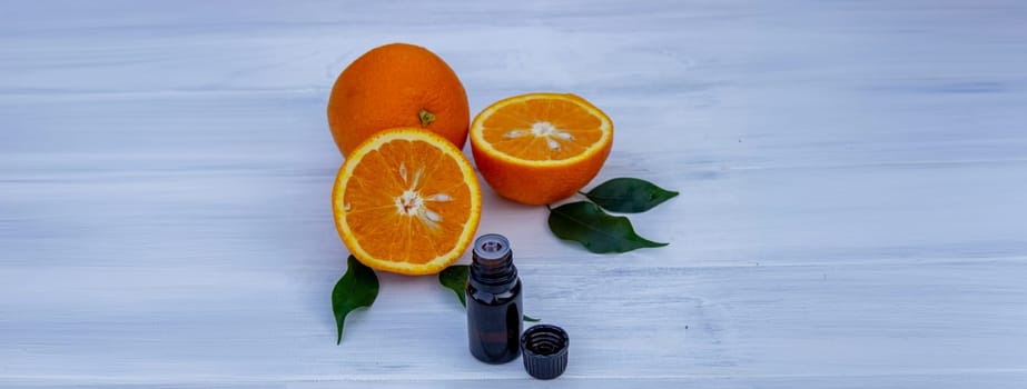 orange essential oil. selective focus