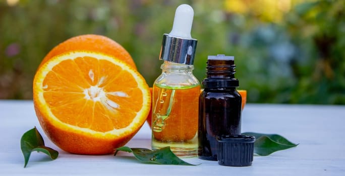 orange essential oil. selective focus