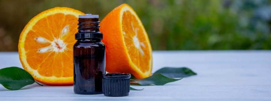 orange essential oil. selective focus