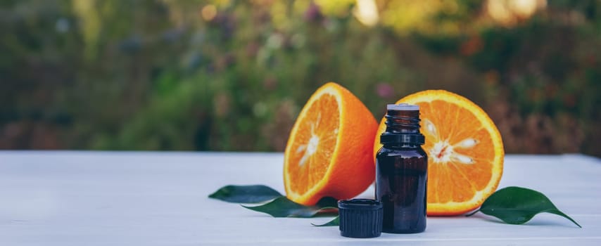 orange essential oil. selective focus