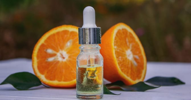 orange essential oil. selective focus