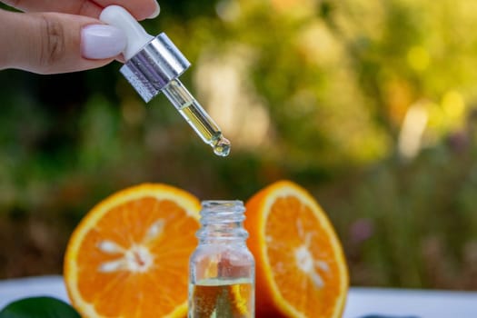 orange essential oil. selective focus