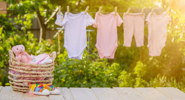 Children's clothes are dried outside. Selective focus