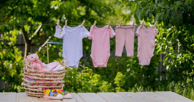Children's clothes are dried outside. Selective focus