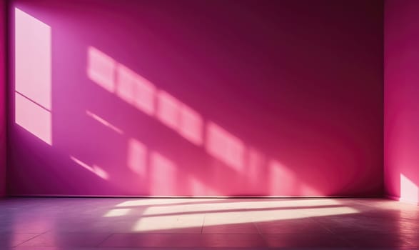 A pink wall is bathed in warm sunlight. The light from a window creates distinct rectangular shadows across the wall, which is otherwise unadorned.