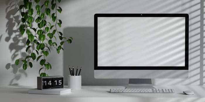 A 3D rendering of a bright home office with a desktop computer and greenery, creating a productive environment.
