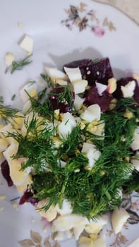 salad with eggs and dill food on a plate, cooking lunch dinner breakfast. High quality photo