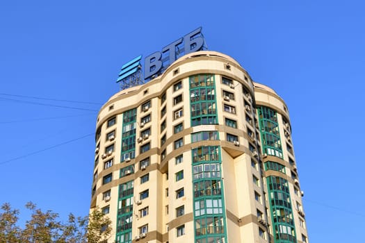 Moscow, Russia - Aug 3. 2024. VTB Bank advertisement on the roof of multi-story residential building. LETTERS