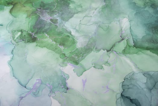 A serene mix of soft green hues creates an abstract watercolor composition that captures the essence of nature through layered textures and gentle gradients.