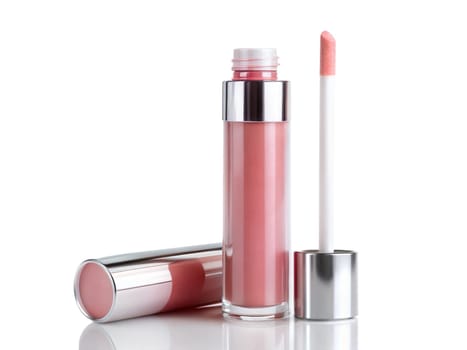 Opened pink lip gloss on white background. High quality photo