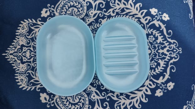 blue plastic soap dish for soap, hygiene object. High quality photo
