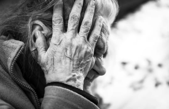 Black and white portrait of very old tired woman in depression. Old woman. 