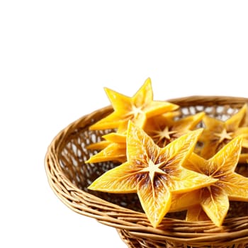 Dried starfruit slices in a celestial wicker basket bright yellow with a star shaped cross. Food isolated on transparent background.