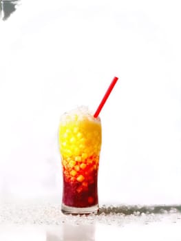 Thai Red Bull Slushie tall glass with crushed ice blended with the iconic energy. Drink isolated on transparent background.