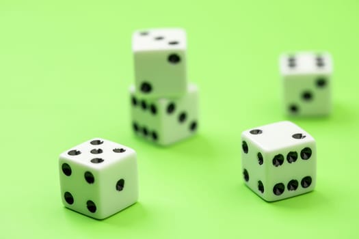 A conceptual photo of different numbered dice showing.