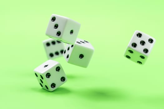 A conceptual photo of dice being rolled on a green table.