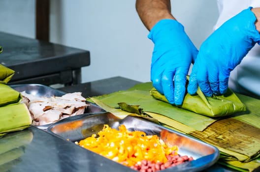 Peruvian recipe for preparing tamales with banana leaves and cornmeal