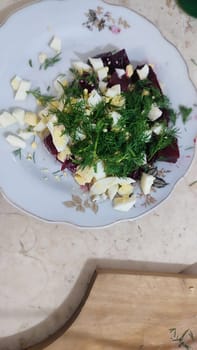 salad with eggs and dill food on a plate, cooking lunch dinner breakfast. High quality photo