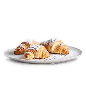 Almond croissants with powdered sugar dusting and almond slices on top Food and culinary concept. Food isolated on transparent background.