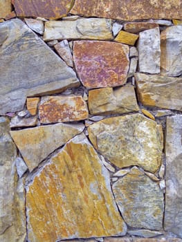 Roughly cut stones wall texture. Natural material background.