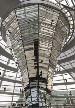 Berlin, Germany - Dec 20, 2023 - Architecture interior of the Cupola of the Reichstag dome is a glass dome constructed on top of the rebuilt Reichstag building. a major tourist attraction of the berlin city, Space for text, Selective focus.