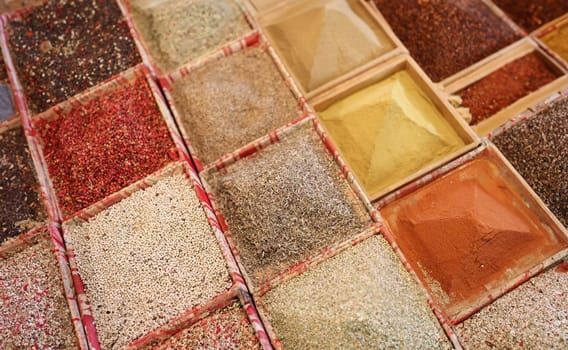 Condiments and spices in store trays. How to choose right spices and seasonings concept