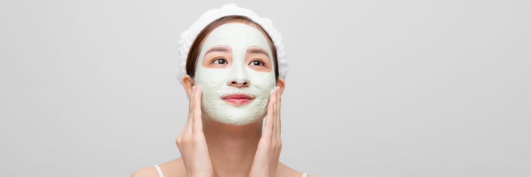 beauty women getting facial mask on web banner
