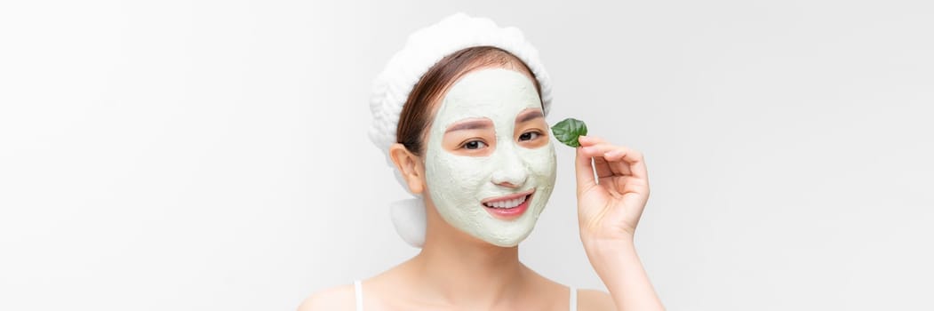 Banner with young woman with clay face mask - natural spa, beauty from nature concept