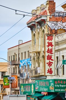 Image of Street signs in San Francisco Chinatown with food businesses