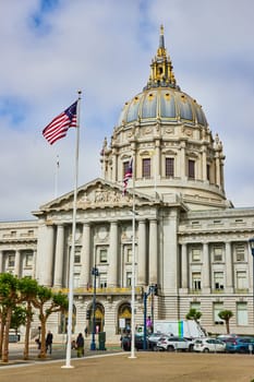 Image of Betsy Ross flags in front of San Francisco city hall