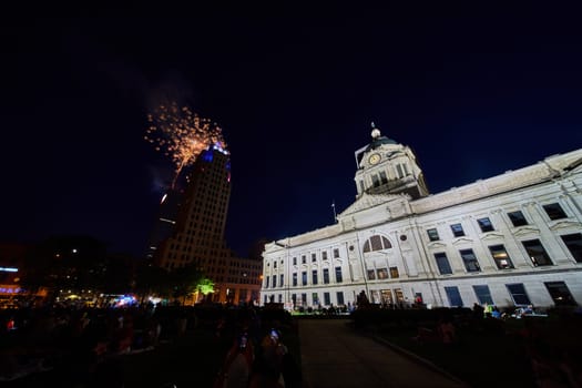 Image of Downtown Fort Wayne fireworks over Lincoln Tower with view of Allen County Courthouse