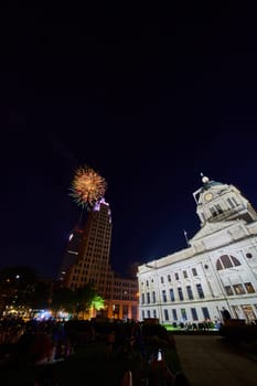 Image of Fireworks from Allen County Courthouse lawn with Lincoln Tower and Indiana Michigan Power building