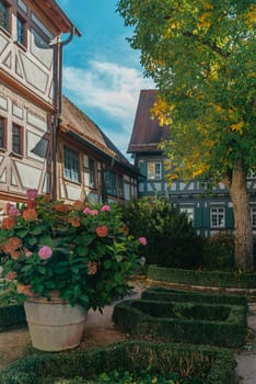 Old national German town house. Old Town is full of colorful and well preserved buildings. Baden-Wurttemberg is a state in southwest Germany bordering France and Switzerland. The Black Forest, known for its evergreen scenery and traditional villages, lies in the mountainous southwest. Stuttgart, the capital, is home to Wilhelma, a royal estate turned zoo and gardens. Porsche and Mercedes-Benz have headquarters and museums there. The 19th-century Hohenzollern Castle sits in the Swabian Alps to the south.