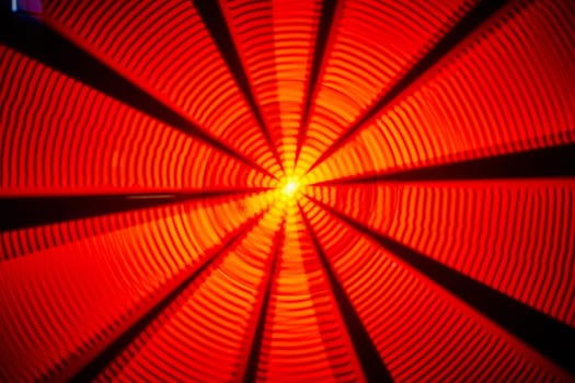 Image of Abstract background asset of yellow sun center with rippling red and orange light and black lines