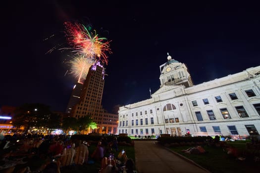 Image of Colorful 4th of July fireworks over Lincoln Tower view from Fort Wayne courthouse lawn