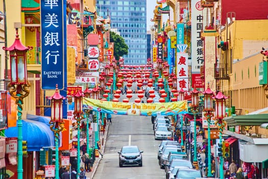 Image of Kung Fu Day banner with Chinese Lanterns spread across busy Chinatown street in San Francisco