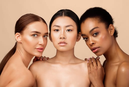 Asian, African And Caucasian Models Girls Posing Shirtless Standing Over Gray Background. Studio Shot. Diverse Beauty