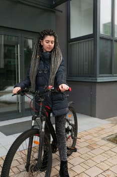 Lifestyle concept, young European woman rented a bicycle.