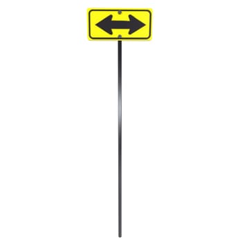 A bright yellow road sign with arrows pointing left and right stands on a black pole.